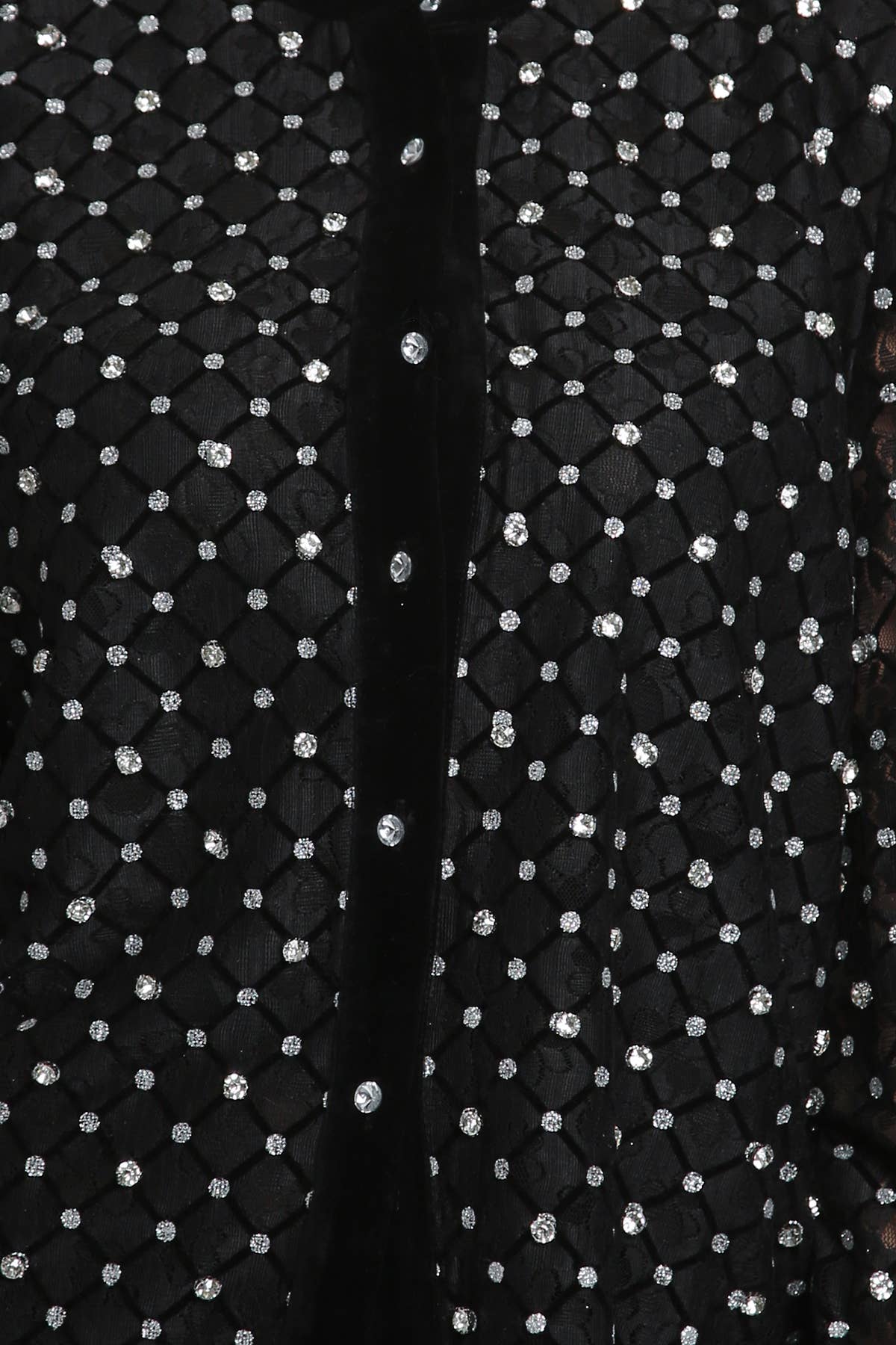 up close detail of black blouse with rhinestone embellishment