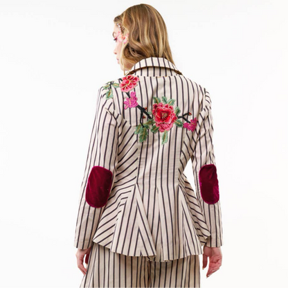 back view of black and cream striped floral embellished blazer