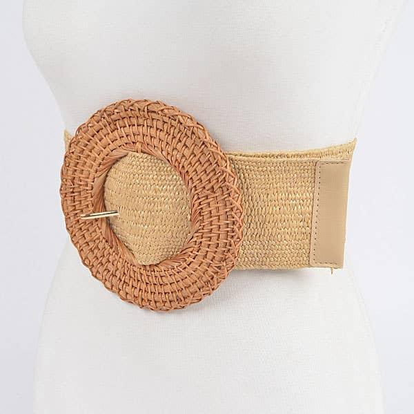 angled profile of tan elastic stretch belt with round rattan buckle